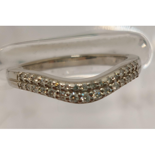 14 - Platinum and diamond ring, approx 0.30cts, in a double row design, approx size M, Hallmarked 750 Bir... 