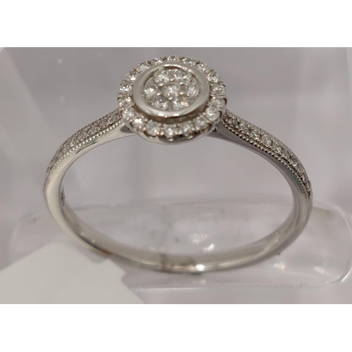 26 - 18ct white gold and diamond halo ring 0.25ct, approx size, stamped 750