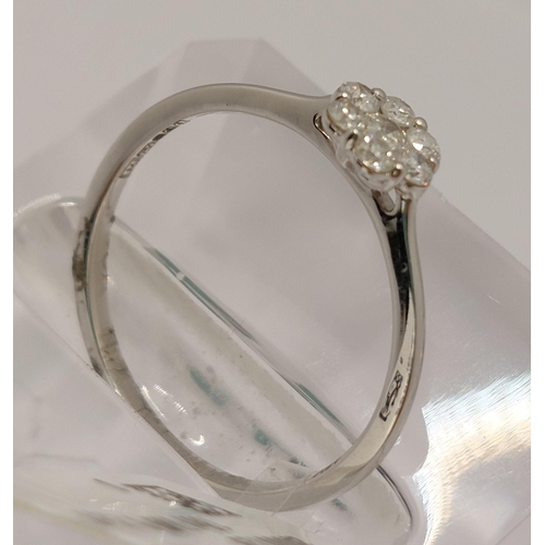 28 - 18ct white gold and diamond ring of flower shape design, approx 0.25ct, approx size M/N, hallmarked ... 