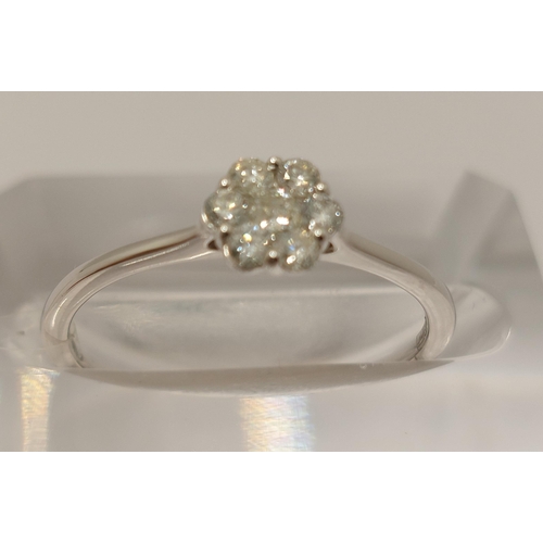 28 - 18ct white gold and diamond ring of flower shape design, approx 0.25ct, approx size M/N, hallmarked ... 