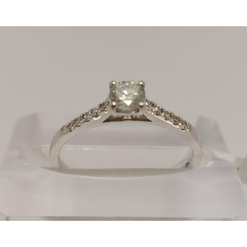 29 - 9ct white gold diamond ring, central stone with smaller diamonds to mount, approx 0.36ct, approx siz... 