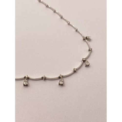 40 - 18ct white gold and diamond necklace with drop diamond design, stamped 750, approx length 16.