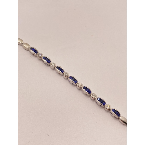 53 - 18kt white gold Sapphire and Diamond bracelet, S 0.65 d 0.18ct, stamped 750