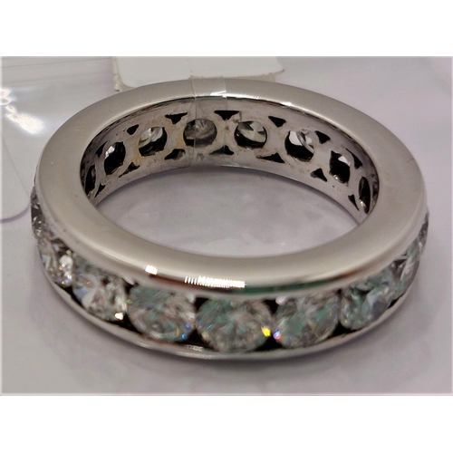 59 - Platinum and diamond full eternity ring, x17 stones of approx 3.4cts in total, approx size J