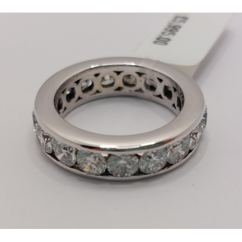 59 - Platinum and diamond full eternity ring, x17 stones of approx 3.4cts in total, approx size J