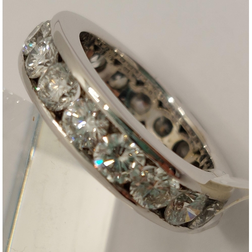 59 - Platinum and diamond full eternity ring, x17 stones of approx 3.4cts in total, approx size J