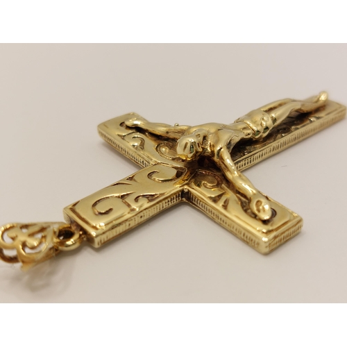 60 - A substantial 9ct gold pendant in the form of  Jesus on the Crucifix overall length 7cm with hallmar... 