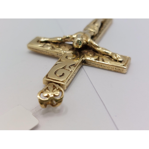 60 - A substantial 9ct gold pendant in the form of  Jesus on the Crucifix overall length 7cm with hallmar... 