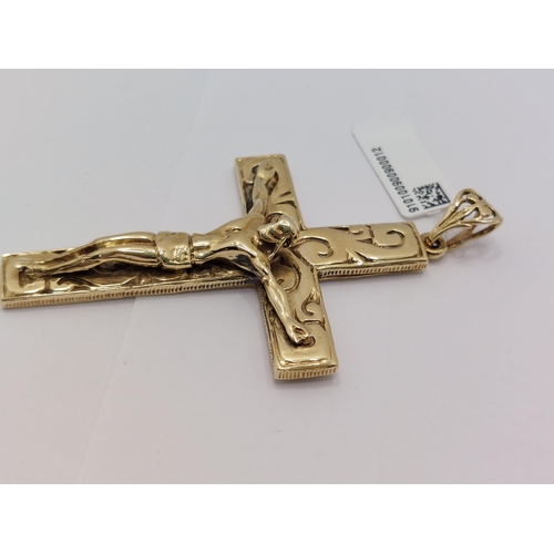 60 - A substantial 9ct gold pendant in the form of  Jesus on the Crucifix overall length 7cm with hallmar... 