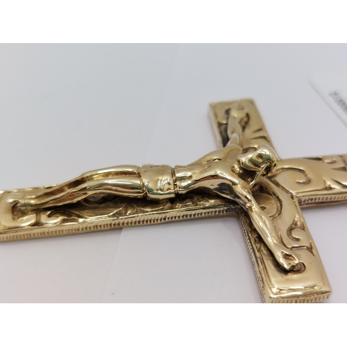 60 - A substantial 9ct gold pendant in the form of  Jesus on the Crucifix overall length 7cm with hallmar... 