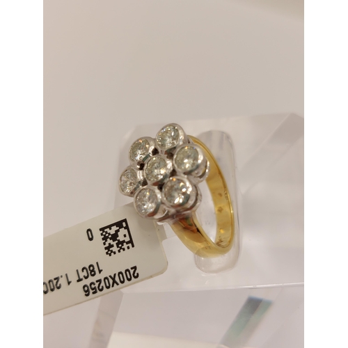 7 - 18ct gold and diamond ring with flower design, approx 1.20ct, approx size H, stamped 750