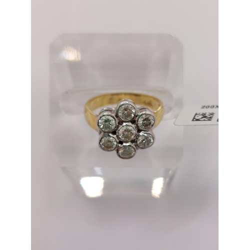 7 - 18ct gold and diamond ring with flower design, approx 1.20ct, approx size H, stamped 750