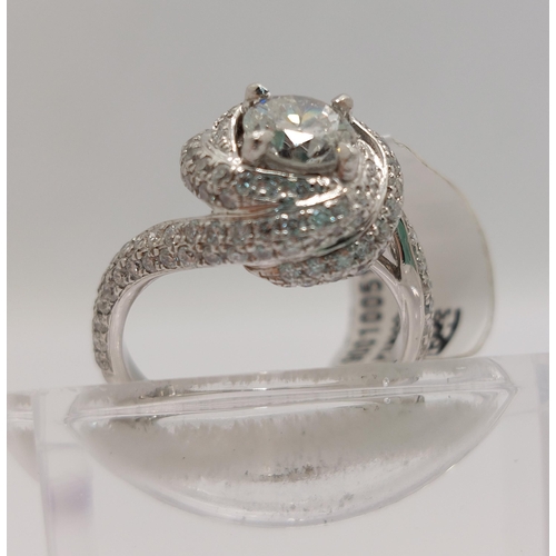 76 - Platinum and diamond ring swirl ring, approx 0.75ct, hallmarked Birmingham 950, approx size H/I