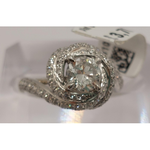 76 - Platinum and diamond ring swirl ring, approx 0.75ct, hallmarked Birmingham 950, approx size H/I