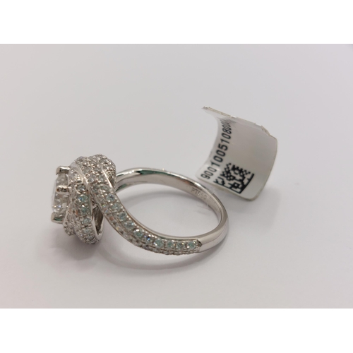 76 - Platinum and diamond ring swirl ring, approx 0.75ct, hallmarked Birmingham 950, approx size H/I