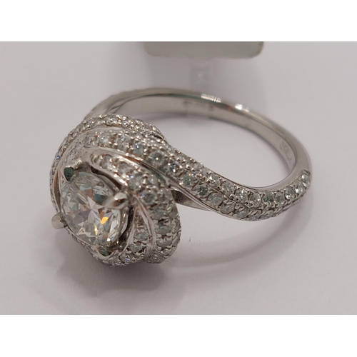 76 - Platinum and diamond ring swirl ring, approx 0.75ct, hallmarked Birmingham 950, approx size H/I