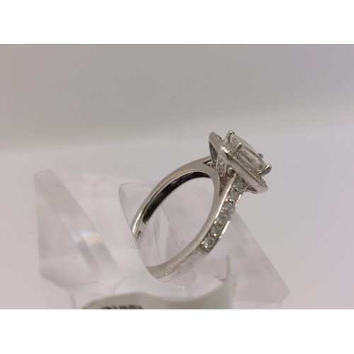 77 - 18ct white gold diamond Ring  approx size G/H  x28 smaller stones .(approx 40ct) surrounding central... 