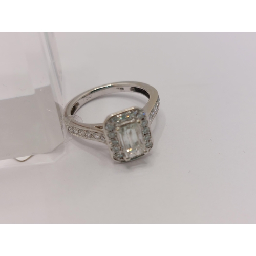 77 - 18ct white gold diamond Ring  approx size G/H  x28 smaller stones .(approx 40ct) surrounding central... 