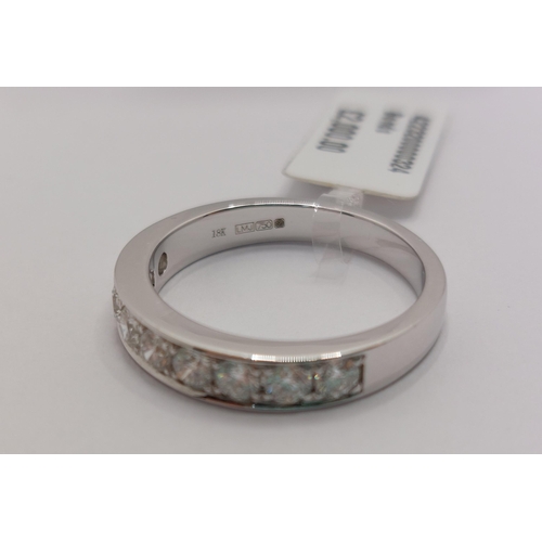 83 - 18ct white gold diamond half eternity ring, approx 0.75ct, approx size M/N, stamped 750