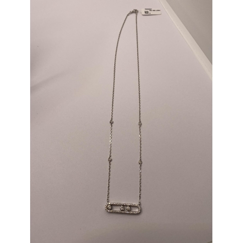 87 - 18ct white gold diamond necklace, approx 0.5ct, diamonds slide along the bar pendant also intermitte... 