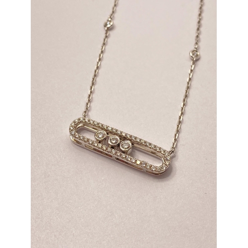 87 - 18ct white gold diamond necklace, approx 0.5ct, diamonds slide along the bar pendant also intermitte... 