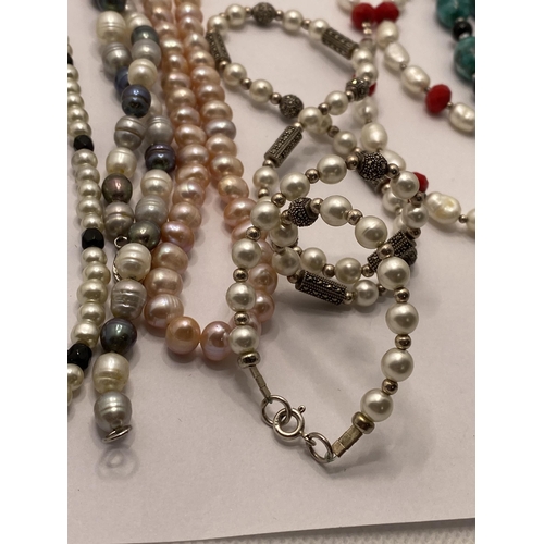 129 - A selection of beaded and pearl necklaces (including one marked 9k) with silver 925 necklaces and br... 