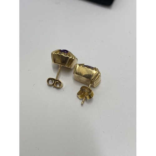 150 - A pair of yellow gold amethyst and diamond earrings stamped 14k. approx gross weight 5.7g