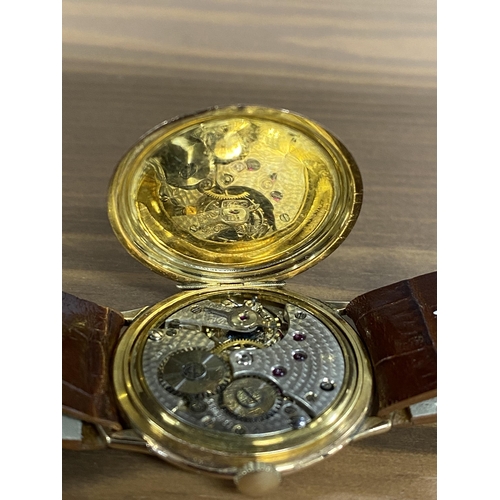 203 - A selection of gold and gold-coloured wristwatches including, a watch marked House of Jobin, 17 jewe... 