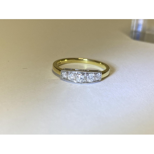 215 - 18ct yellow/white gold graduated five stone ring, approx size M, marked 750