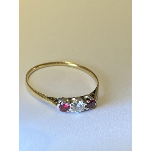 216 - Vintage 18ct yellow gold three stone diamond and ruby ring, approx size R, unmarked, central diamond... 