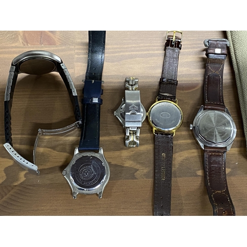 222 - A selection of watches to include one watch with two subsidiary dials stamped Sisley, another stampe... 