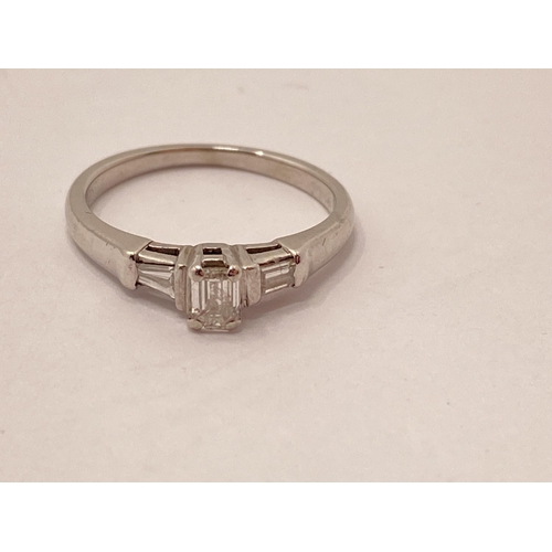 230 - 18ct white gold diamond baguette style ring, approx size K, hallmarked 750