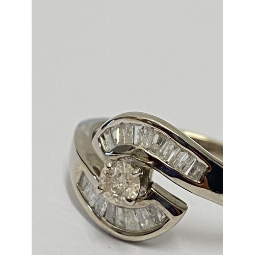 234 - 14ct white gold diamond halo style ring, stamped 14Kapprox 0.5ct, size N, A/F