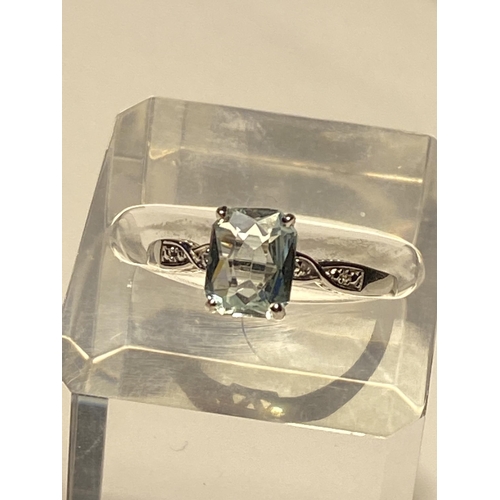 235 - 10ct white gold princess cut aqua marine ladies ring, marked 10ct, approx size N