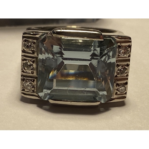 236 - Very substantial (tested) 18ct white gold aquamarine and diamond ring of rectangular form, central s... 