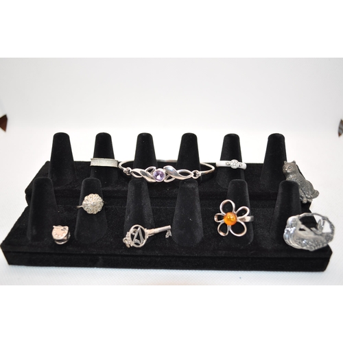 123 - A selection of silver jewellery including bracelets, rings, necklaces and brooches to include pewter... 