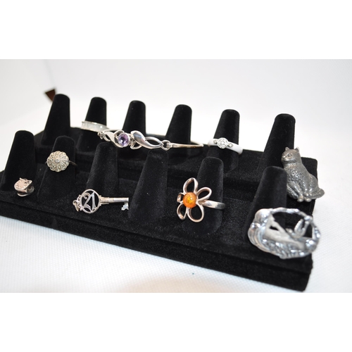 123 - A selection of silver jewellery including bracelets, rings, necklaces and brooches to include pewter... 