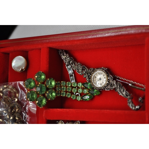 128 - Two boxes of costume jewellery to include an iridescent dragonfly brooch, rings, two sets of screw b... 