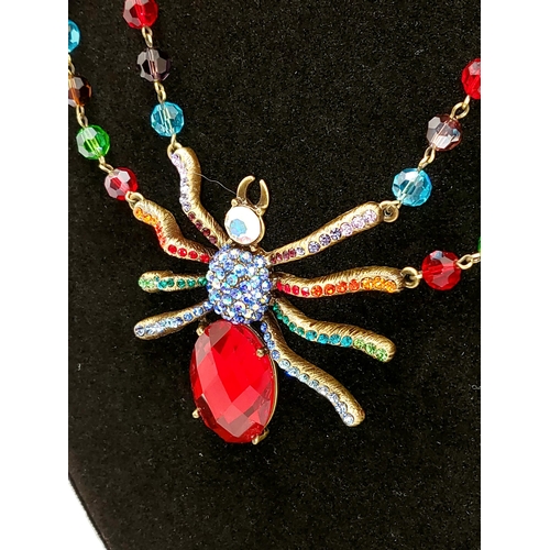 136 - A Butler and Wilson large rainbow / multicoloured spider necklace (approx. size of spider l 7cm x w ... 