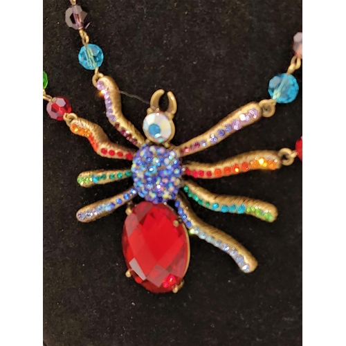 136 - A Butler and Wilson large rainbow / multicoloured spider necklace (approx. size of spider l 7cm x w ... 