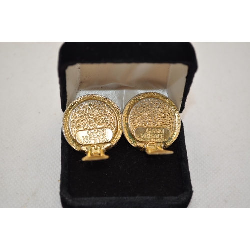 152 - Versace gold tone clip on earrings