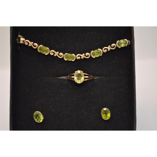 164 - 9ct gold Peridot bracelet, earrings and ring boxed set, hallmarked 375, approx ring size O