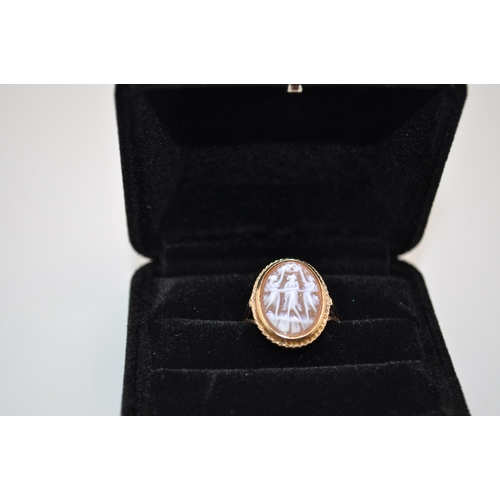 193 - 9ct Gold cameo ring (depicting Grecian ladies) size O/P hallmarked Edinburgh 1975