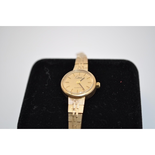 226 - A 9ct gold Swiss made ladies watch with small face, marked with name Limit on the face alongside a s... 