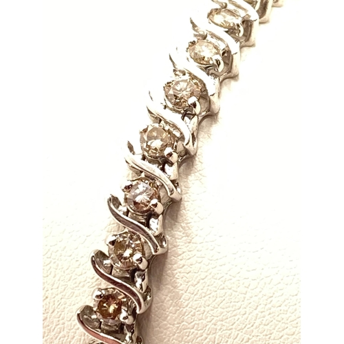 104 - Diamond bracelet in excess of 2cts