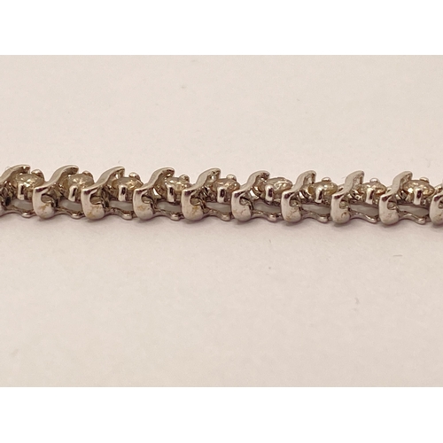 104 - Diamond bracelet in excess of 2cts