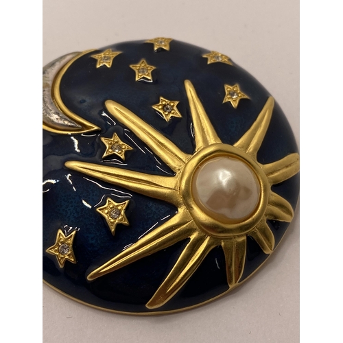 116 - Sun, Moon, and Stars gold tone brooch marked with KL monogram (Karl Lagerfeld)