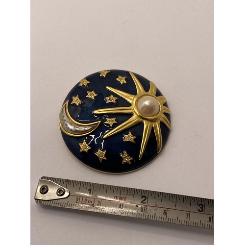 116 - Sun, Moon, and Stars gold tone brooch marked with KL monogram (Karl Lagerfeld)