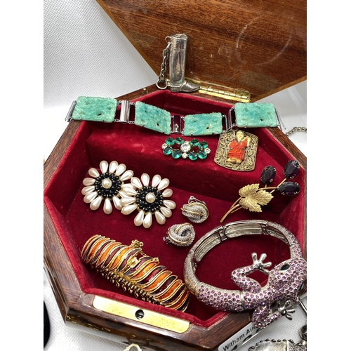 135 - Two jewellery boxes with inlaid decoration containing mixture of costume jewellery to include tortoi... 