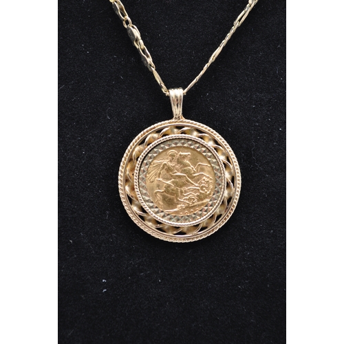 160 - A 1909 Edward VII gold sovereign mounted in 9ct gold coin pendant holder together with 9ct gold neck... 